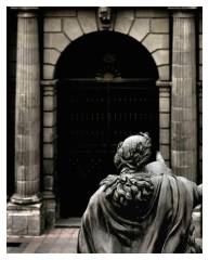 <i><b>Memento mori.</b></i> Equestrian statue of Charles IV facing the façade of the Colegio de Minería, Mexico City (2007).