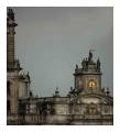 <b>El mascarón de proa.</b> Balcony and cube-shaped clock tower on the main façade of the cathedral, Mexico City (2007).